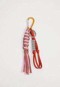Keychain set featuring braided fabric in pink and brown, with a red leather strap and a silver circular hardware accent. Includes a yellow carabiner.