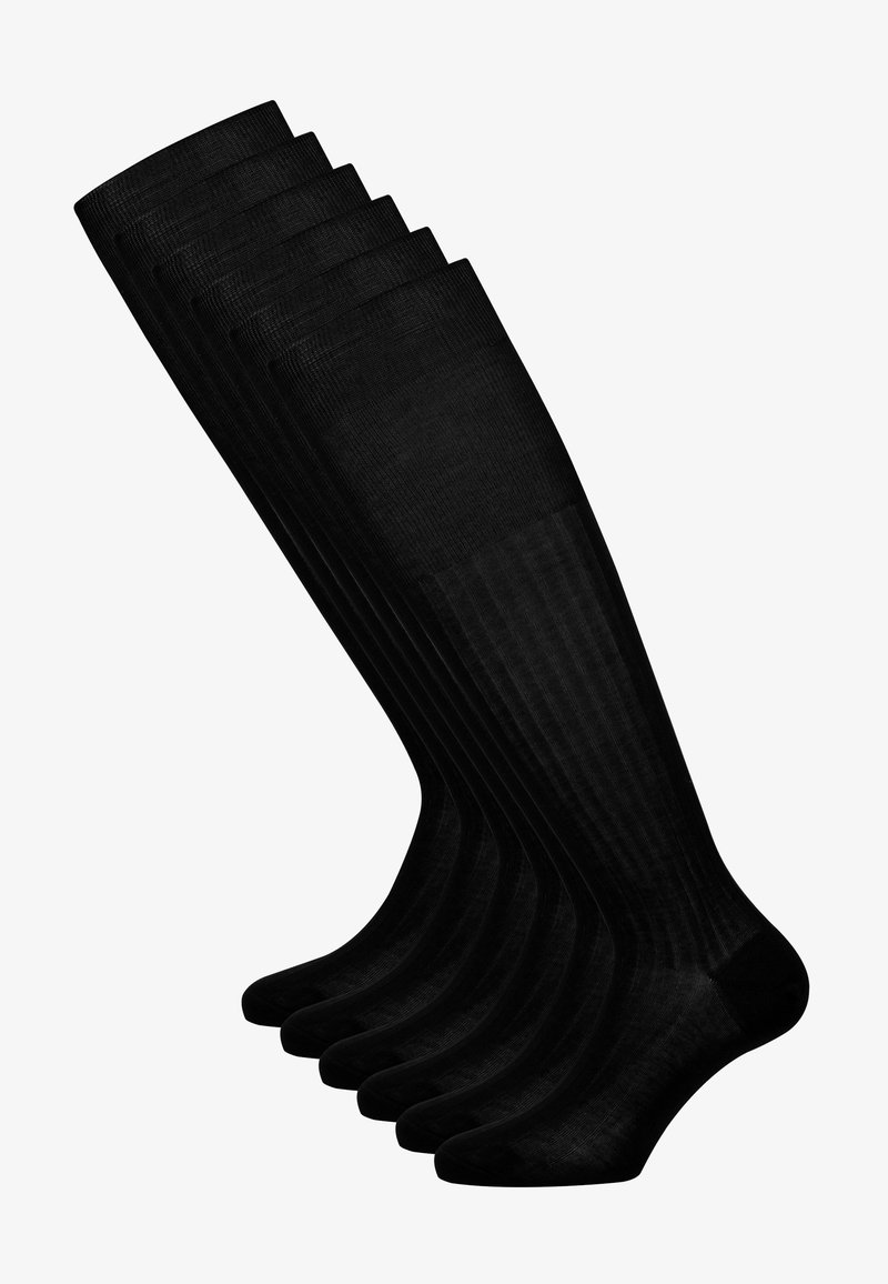 Medias negras hasta la rodilla, con una textura suave y un delicado canalé. Están hechas de un material blando, disponibles en un juego de múltiples pares.