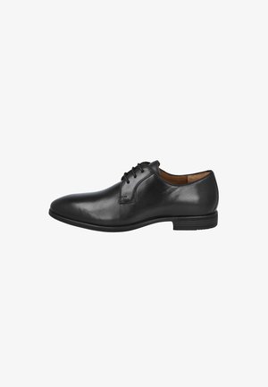 Zapato de vestir para hombre de cuero negro con cordones cerrados, punta redondeada y tacón bajo apilado, mostrado en perfil lateral derecho.