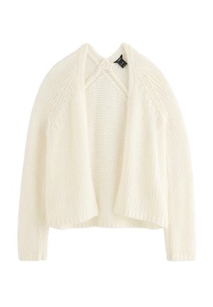 Blød, cremefarvet strikket cardigan med lange ærmer og åben front, vist fladt mod en hvid baggrund.