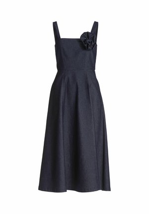 Denim dress with a square neckline, wide shoulder straps, and a pleated skirt. Features a decorative fabric flower on the left shoulder.