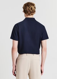 Calliope UN BOTTONE - Poloshirt - blu notte