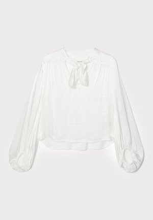 Blusa bianca con scollo rotondo e dettaglio a fiocco annodato. Presenta maniche lunghe e svasate con polsini arricciati e una vestibilità ampia. Tessuto morbido e leggero.