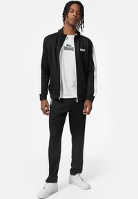 Lonsdale NORMALE PASSFORM MANHAY - Treniņtērps - black white