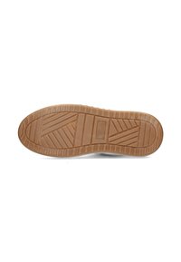 Rubberen schoenzool in tan kleur, met een geprofileerde grip met groeven en ribbels voor traction. Vlakke en ronde vorm met een gladde afwerking.