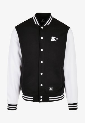 Black and white varsity jacket with a button front, ribbed cuffs, and collar. Features embroidered logo and patterned wristbands.