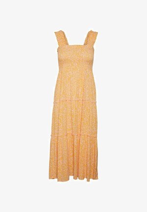 Gelbes Maxikleid mit floralen Mustern, Rüschung an den Trägern, gerafftem Oberteil und gestuftem Rock. Leichter Stoff mit weicher Textur und subtilen Mustern.