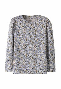 Kinderbloes met lange mouwen en een dicht patroon van kleine blauwe, gele en zwarte bloemen op een lichte achtergrond.