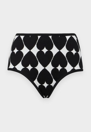 Hoge taille zwart-wit gebreide slips met een diamantpatroon en grote hartvormen. Soepele textuur en elastische tailleband.