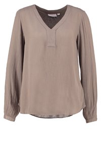 Blouse taupe à manches longues avec une texture subtile, encolure en V avec une patte de boutonnage cousue, et poignets boutonnés.