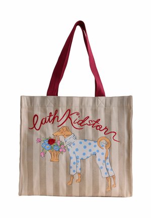 Beżowa torba na ramię w paski z czerwonymi uchwytami, przedstawiająca psa w niebieskim stroju w kropki trzymającego kosz pełen kwiatów oraz czerwony, kursywny napis nad nim.