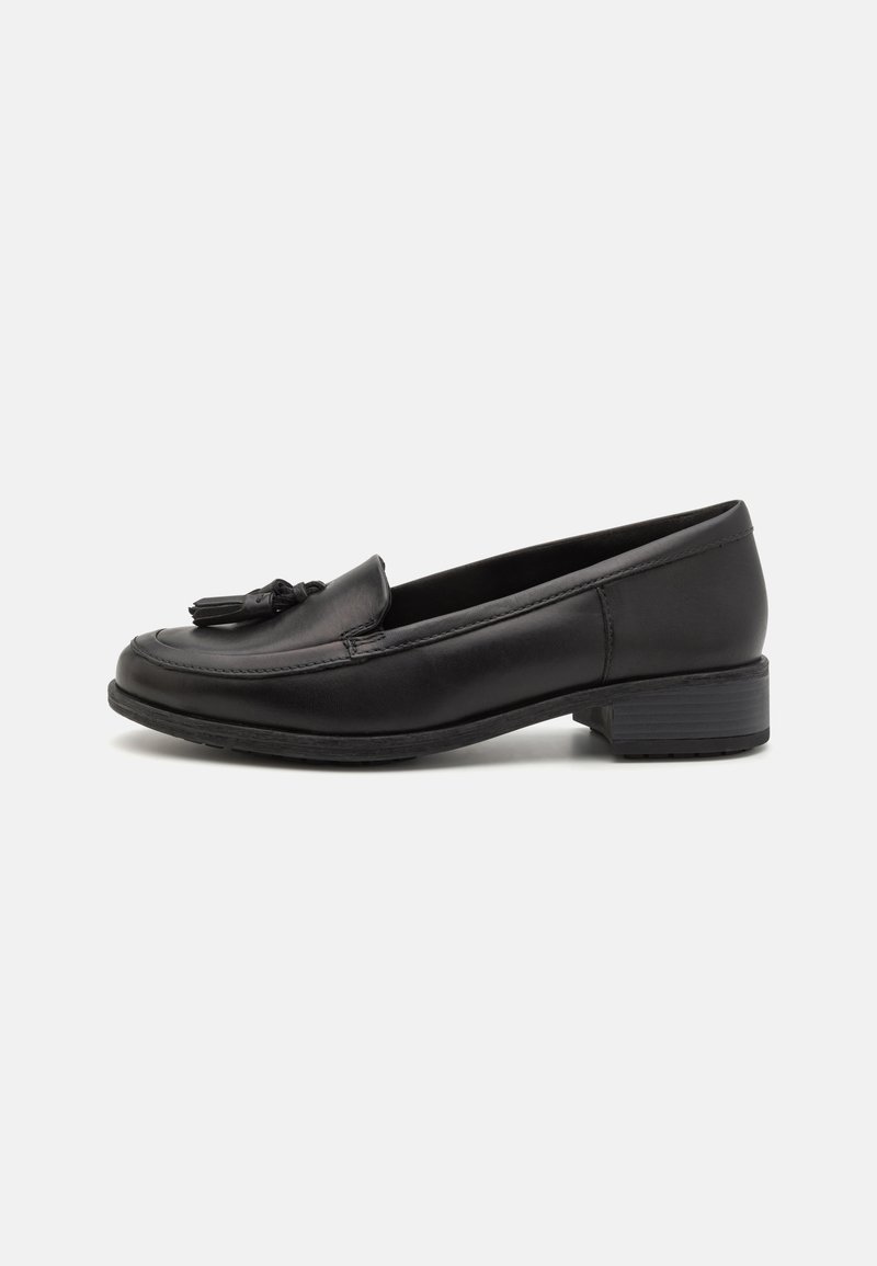 Mocasini din piele neagră, cu vârf rotund, detaliu decorativ cu ciucuri în față și toc mic pătrat. Textură netedă și design minimal.