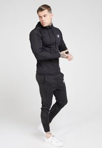 SIKSILK CREASED PANTS - Pantaloni sportivi - black