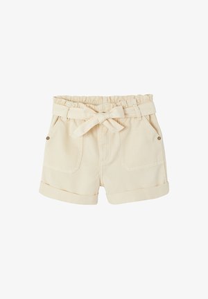 Beige cotton shorts with rolled cuffs, front pockets, elastic waistband, and a tied fabric belt at the waist.