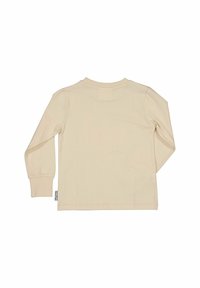 Krämfärgad långärmad tröja med rund halsringning, synlig sömnad och ett litet vitt tygmärke på vänster sidsöm.