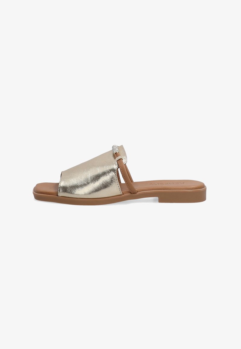 Metallic gold slide sandals with a cushioned brown sole. Features an open toe design and a decorative buckle accent on the upper strap.