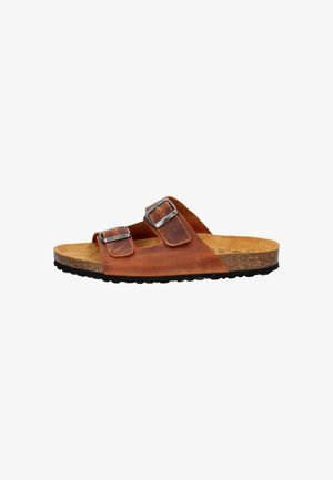 Brown leather open-toe sandal with two adjustable silver buckles, cork footbed, and black textured sole viewed from the side.