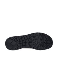 Suela de goma negra con textura en la superficie. Presenta patrones angulares para agarre. Bordes suaves con área de puntera redondeada. Sin marcas visibles.