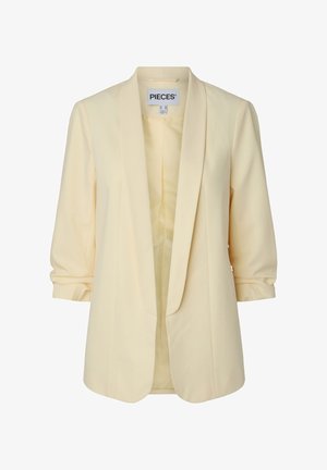 Svetlo rumen blazer z zavihanimi rokavi, odprt spredaj in širokimi ovratniki, prikazan na preprostem belem ozadju.