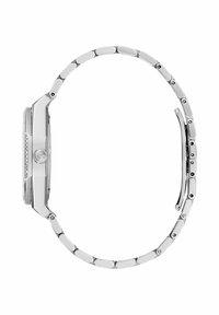 Hõbedatooniline käekell ristkülikukujulise korpusega, metallist rihm, millel on ovaalsed lingid, ning väikeste kristallidega ääristatud bezel.