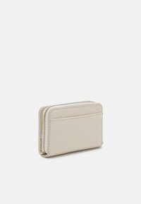 Calvin Klein Jeans SCULPTED ZIP AROUND DEBOSS - Portafoglio - birch