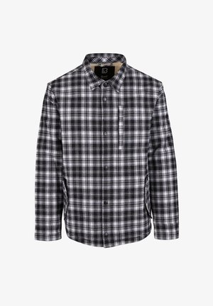 Black and white plaid shirt made of fabric with a button-up front, long sleeves, and a chest pocket. Features a classic collar and a slightly textured surface.