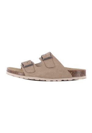 Sandalia deslizante beige de ante con dos correas ajustables con hebilla y plantilla de corcho contorneada sobre fondo blanco.