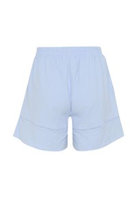 Gaiši zili kokvilnas šorti ar elastīgu jostasvietu, ar brīvu piegriezumu un apakšmalu, kas izcelta ar smalkiem šuvumu akcentiem.