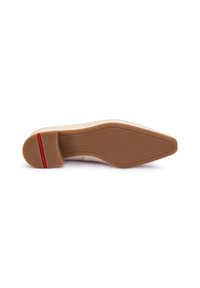 Beige shoe sole with smooth tan rubber surface, slight curvature, and a red accent. Features embossed brand logo and traction pattern.