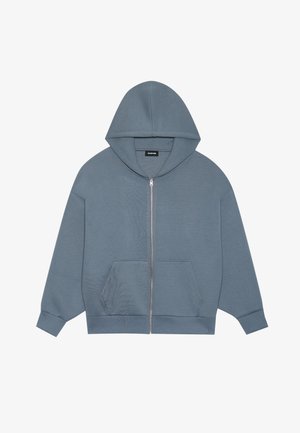 Vaaleansininen vetoketjullinen huppari, jossa on nyöritettävä huppu, etutasku ja ribattu hihansuu. Valmistettu pehmeästä kankaasta, jossa on sileä pinta.