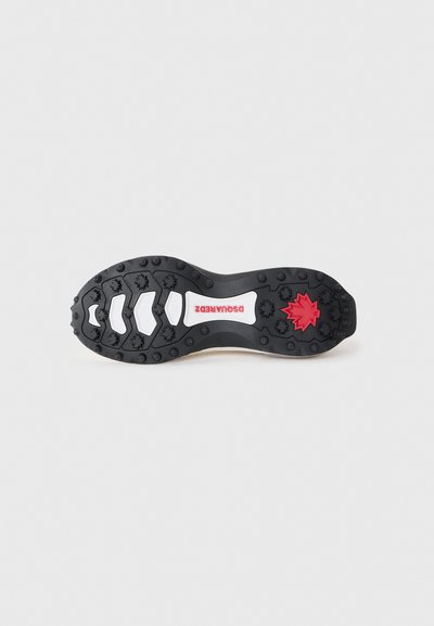 Black shoe sole with deep treads, white accents, red maple leaf design, and red DSQUARED2 logo on a white background.