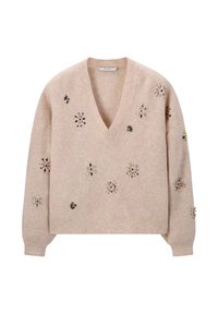 Beiger Strickpullover mit V-Ausschnitt, verziert mit floralen Mustern aus Pailletten und Perlen. Lange, leicht puffige Ärmel.