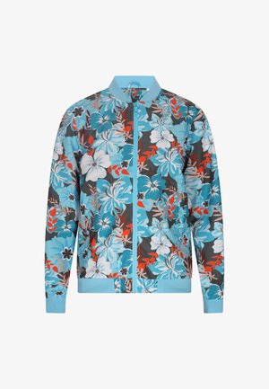 Chaqueta bomber floral con flores azules, blancas y rojas sobre un fondo oscuro. La tela tiene una textura suave con puños y dobladillo acanalados.