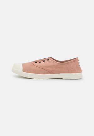 Canvas slip-on shoe in pastel pink with a white rubber toe cap, featuring eyelets for laces and a textured fabric upper.