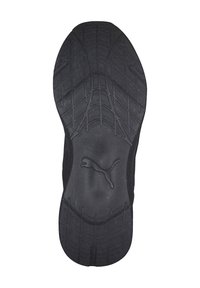 Schwarze Sneaker-Sohle mit einem strukturierten Griffmuster und einem zentralen Puma-Logo. Das Material scheint gummiert zu sein mit erhöhten Merkmalen für eine bessere Bodenhaftung.