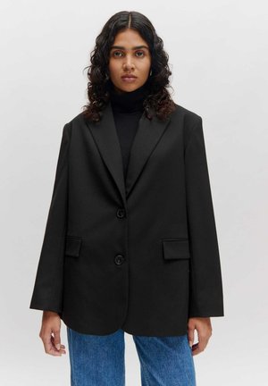 Black blazer made of smooth fabric, featuring a notched lapel, two buttons, and side pockets. Oversized fit with a structured silhouette.