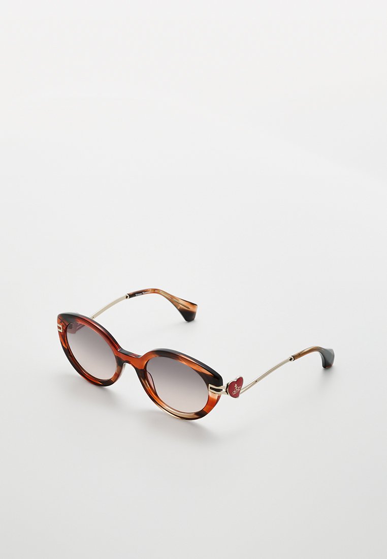 Schildkrötenmuster Sonnenbrille mit ovalen Gläsern, Metallbügeln und herzförmigen Akzenten an den Schläfen. Gradient-Gläser verleihen einen stilvollen Akzent.