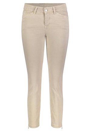 Beige skinny jeans laget av en blanding av bomull. Har glidelås i hemmen, frontlommer, og knappelukking. Glatt tekstur.