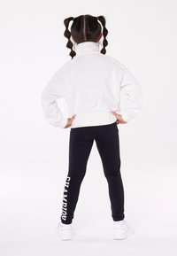 Champion ICONS HALF ZIP - Polo krekls - off-white