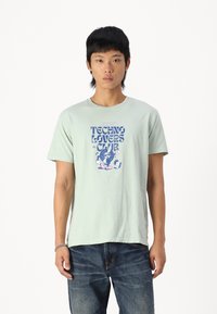 Kaotiko TECHNO LOVERS CLUB UNISEX - Camiseta estampada - green