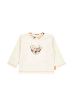Cream-colored long-sleeve baby shirt with orange stitching and a bear face wearing sunglasses embroidered on the chest.