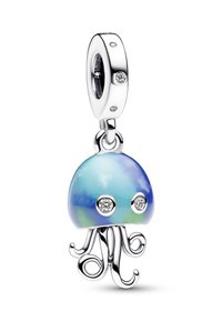 Pakeljne meduze v srebru z modro in zeleno emajlno obdelavo. Ima dve prozorni kamni za oči in tekoče lovke za podrobnosti.