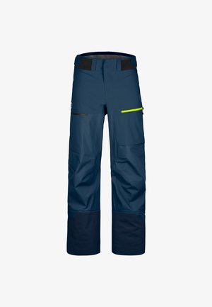 Navy blue waterproof ski pants made of textured fabric, featuring side pockets, adjustable waistband, and black lower cuffs for durability.