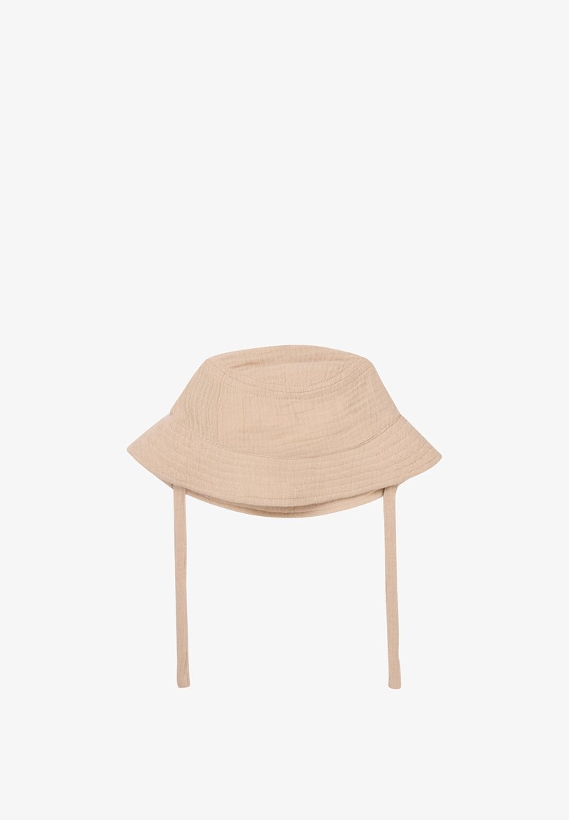 Beige buckethatt tillverkat av texturerad tyg; har en bred, utvriden skärm och två justerbara snören på sidorna.