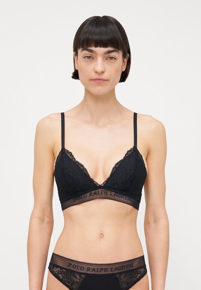 Černý krajkový bralet s V-čkovým designem, tenkými nastavovacími ramínky a pásem s logem "POLO RALPH LAUREN". Texturovaný a průsvitný.