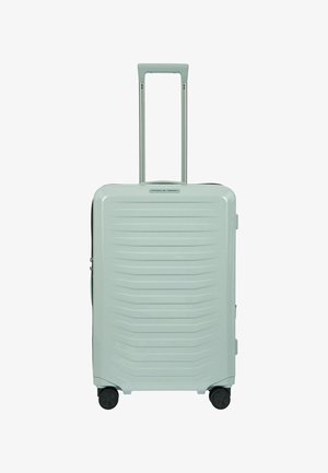 Hartschalenkoffer mit strukturierter mintgrüner Außenseite, zwei glatten Rädern, einem ausziehbaren Griff und einem Reißverschlussfach.