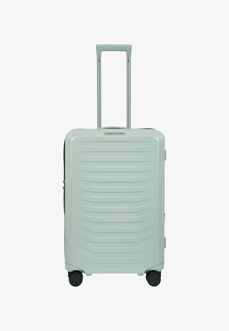 Hartschalenkoffer mit strukturierter mintgrüner Außenseite, zwei glatten Rädern, einem ausziehbaren Griff und einem Reißverschlussfach.