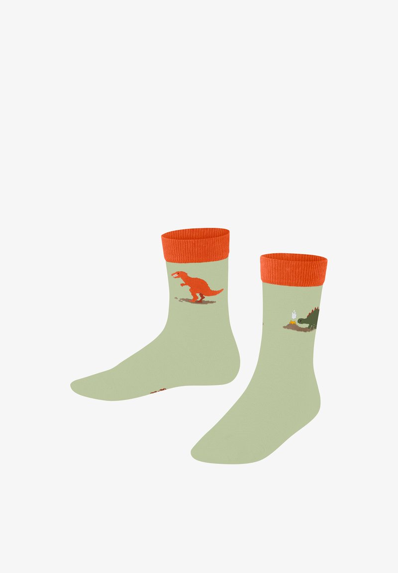 Chaussettes vert clair avec des poignets orange ornées de dinosaures dessinés en rouge et vert, accompagnés de petits détails au sol.