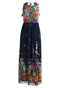Ärmlös marinblå maxiklänning med flerfärgad blommönstrad överdel och nederkant, samlad midja och knytning i halsen.