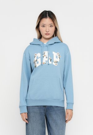 Light blue hoodie made of soft fabric, featuring a front pocket and a floral-embellished "GAP" logo on the chest.